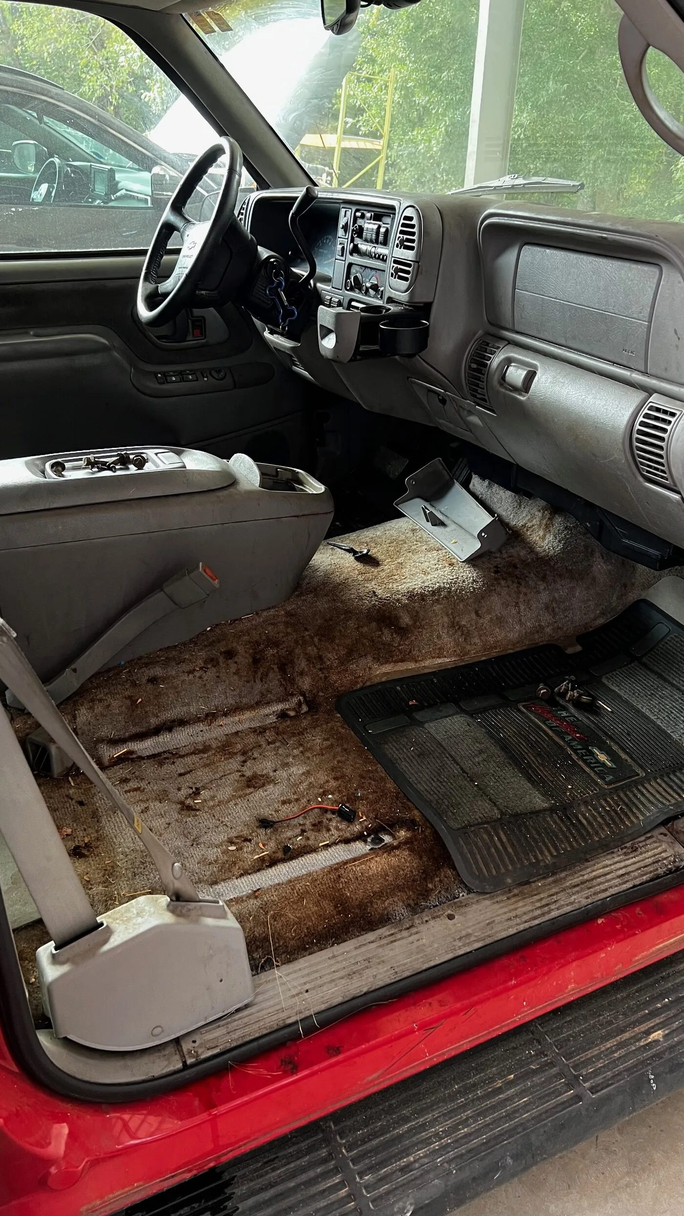 Red Suburban — interior before